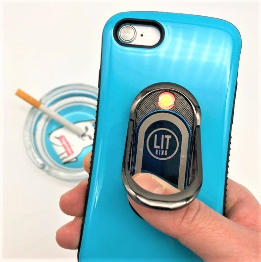 Blue LIT Ring attached to blue phone over supreme ashtray with cigarette