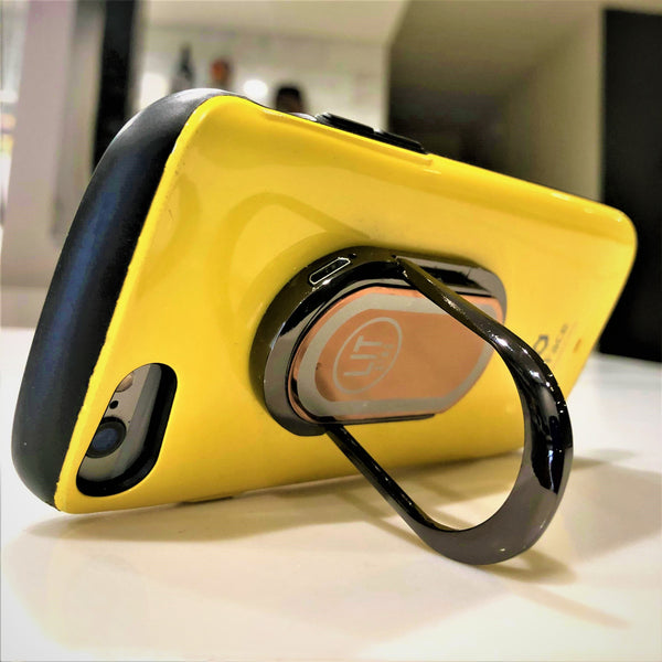 Copper LIT Ring using kickstand and attached to yellow phone
